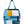 Quilted tote bag with geometric pattern hanging on a hook.