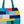 Colorful quilted tote bag with geometric pattern on a white background