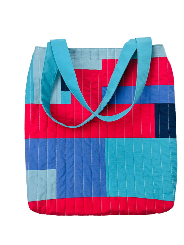 Tote bag with blue and red striped pattern on a white background